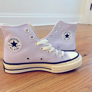 Converse Women’s size 5 high top light purple.